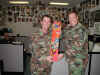 TSgt Skidmore receiving his first fishing rod from MSgt Husava. Tyndall WSEP AGE