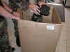 TSgt Skidmore being paked up and shipped to Osan