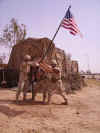 MSgt Holland raising the Flag at Balad AB, Iraq