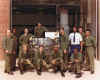 Tech School Grad Jul 1982 - Bruce Brower (MSgt Retired) 1982-2004 - kneeling down centered in front of the control panel.